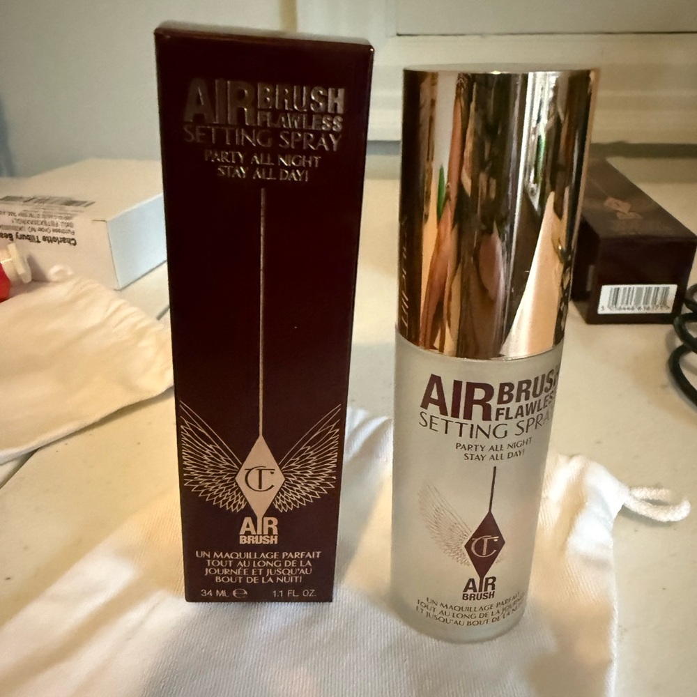 Charlotte Tilbury Gold and White Setting Spray, 34ml